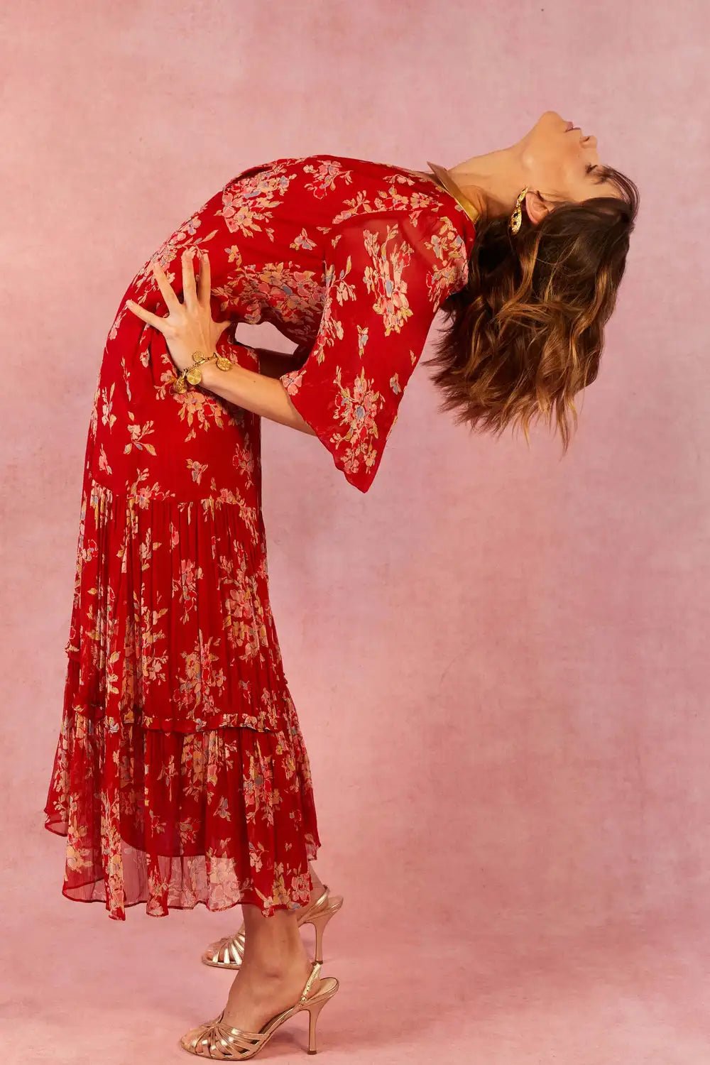 Elevate your style with our Elsie Midi Dress. Handmade with high quality materials, this designer dress boasts intricate and vibrant red printing that will make a statement. With attention to every thread, this dress exudes luxury and sophistication. Elevate your wardrobe with this must-have piece.