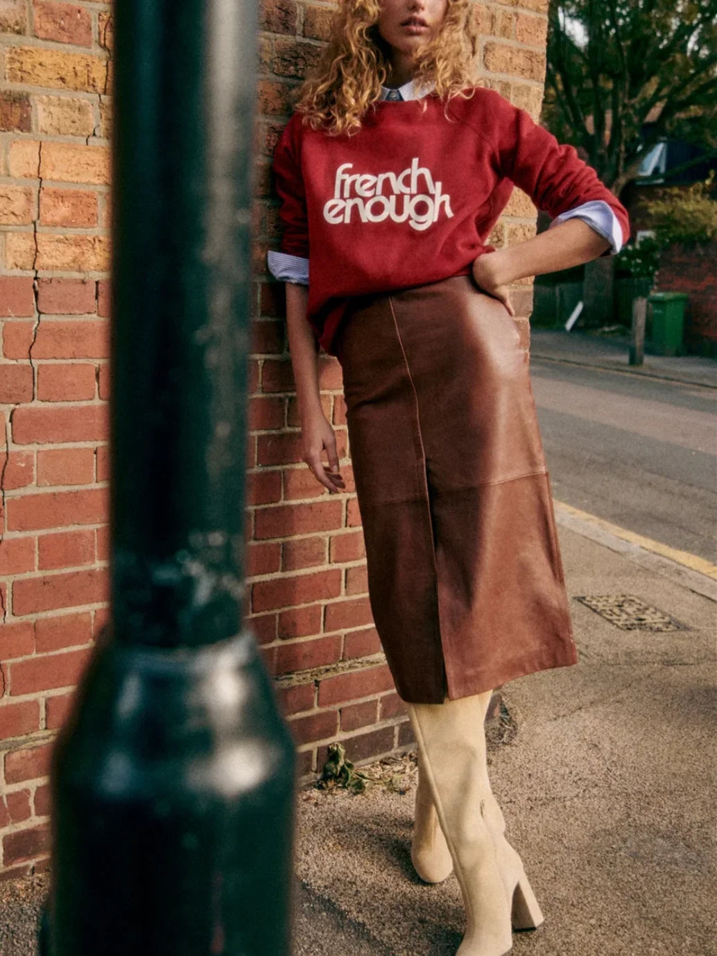 Stay comfy and stylish with this long-sleeved organic cotton sweatshirt. Show off your love for French culture with the "French Enough" print on the front, while staying cozy with the round neckline. Good for you and the environment.