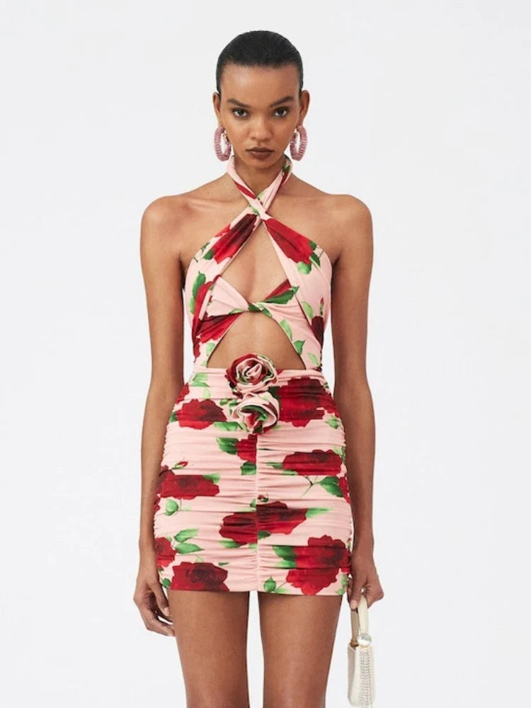 Fitted and ruched in signature Magda Butrym style, this minidress is shaped with alluring cutout detailing and a sculpting halter neckline. It’s made from stretchy floral jersey with intricately crafted floral appliqués.