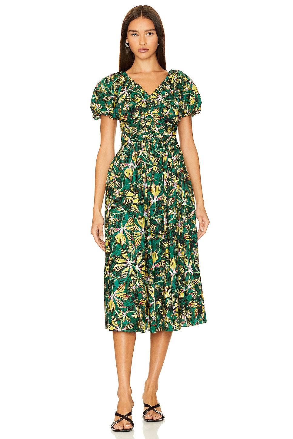 Indulge in the timeless elegance of our Cleobella Dress. This stunning midi dress features a chic floral design in a charming shade of green, radiating a romantic aura. Elevate your wardrobe with this luxurious piece, perfect for any occasion