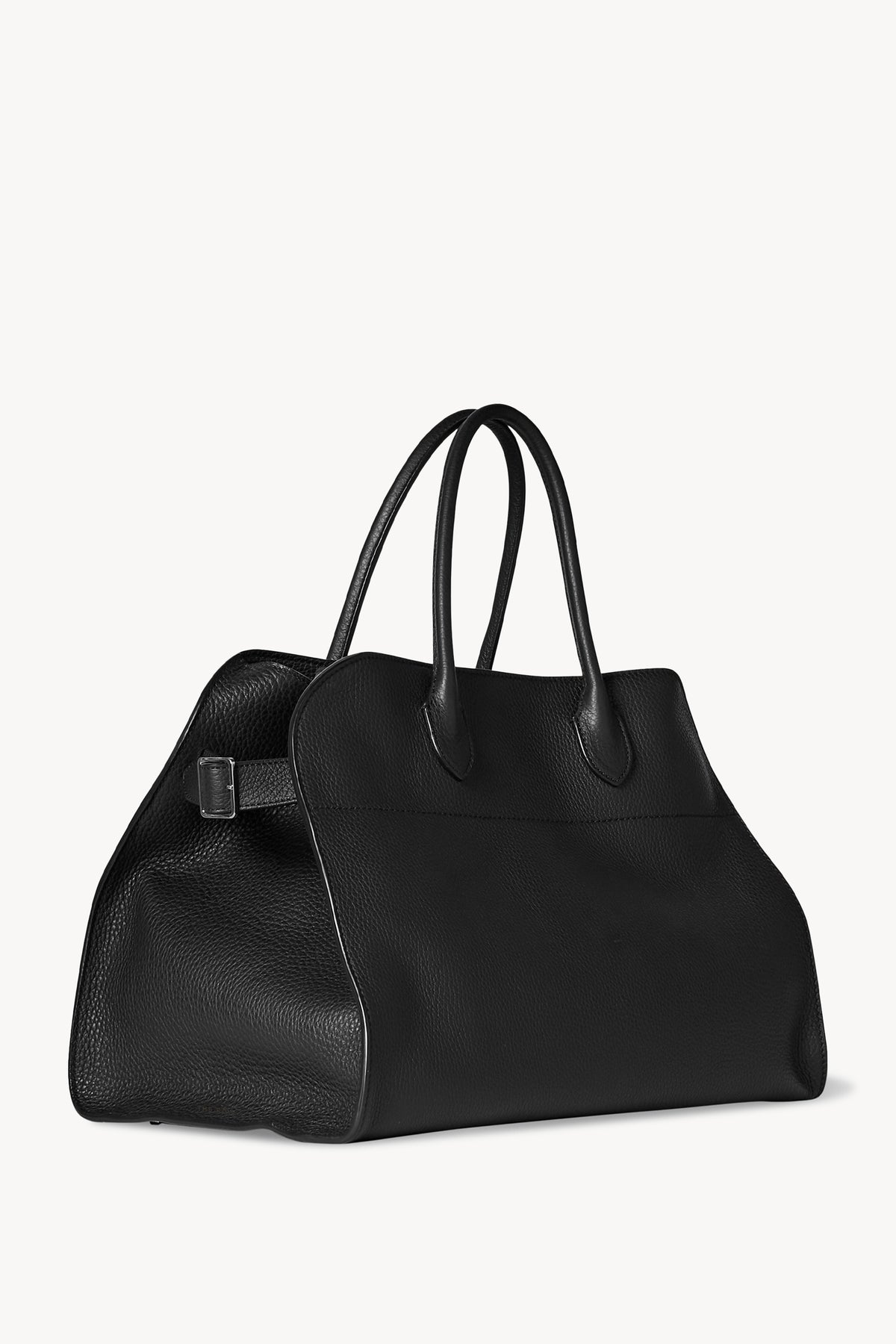 Introducing the Soft Margaux 17 Bag, a timeless piece of luxury crafted from the finest matte grained calfskin leather. With its softly structured design, belted gusseted side panels, and interior toggle closure, this top-handle bag is both functional and stylish. Elevate your wardrobe with this elegant and exclusive accessory.