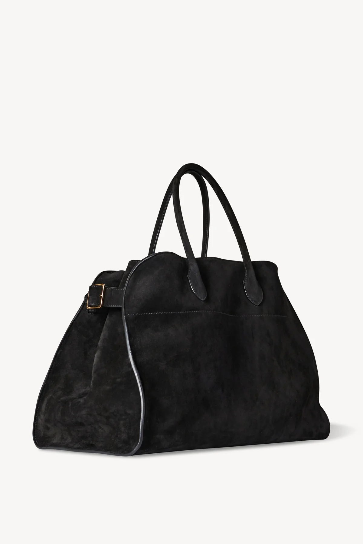 Discover the ultimate in luxurious and everyday style with The Row's Soft Margaux 17 suede tote. Expertly crafted in Italy from supple mocha brown suede, this bag features two rolled top handles, gusseted sides, and a spacious canvas lining. Upgrade your wardrobe with this effortlessly chic and versatile bag.