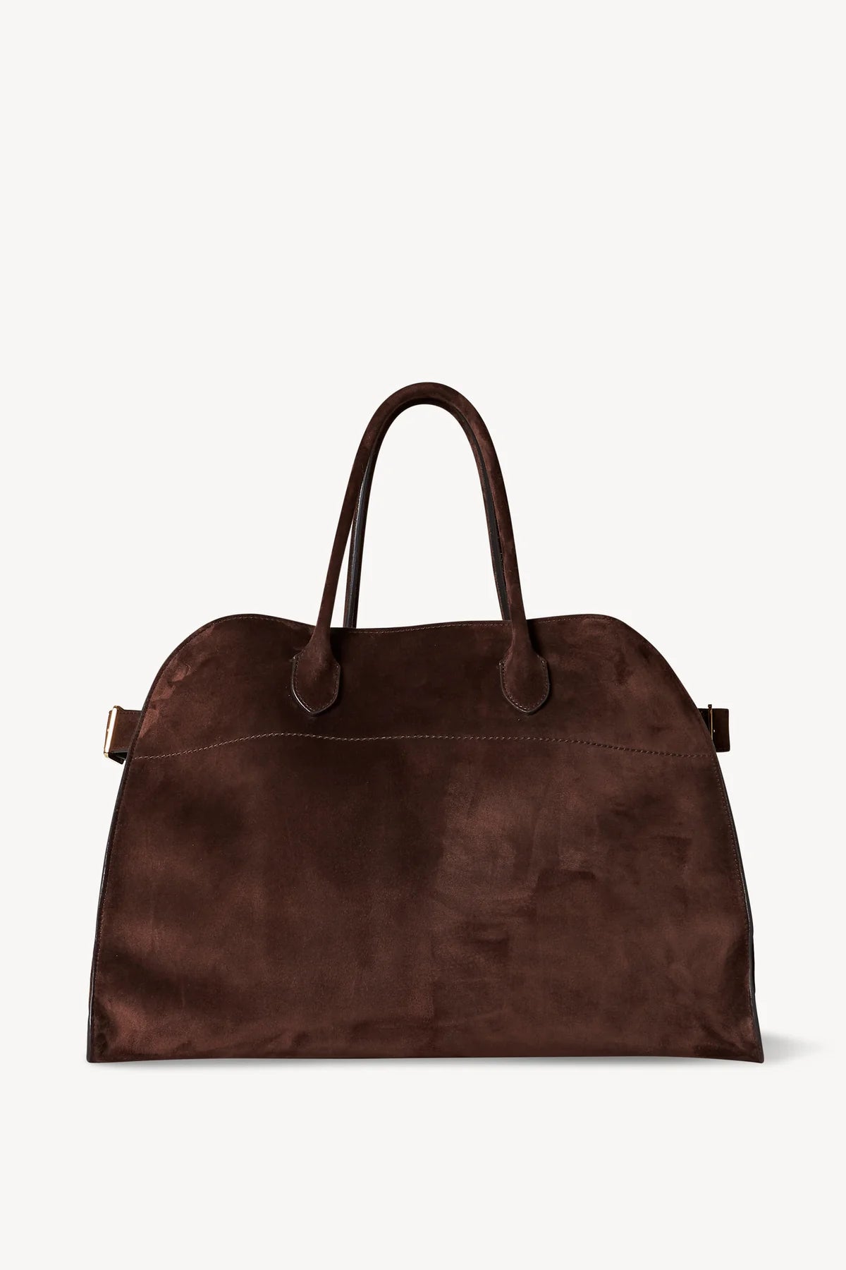 Discover the ultimate in luxurious and everyday style with The Row's Soft Margaux 17 suede tote. Expertly crafted in Italy from supple mocha brown suede, this bag features two rolled top handles, gusseted sides, and a spacious canvas lining. Upgrade your wardrobe with this effortlessly chic and versatile bag.