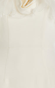Crafted from a luxurious linen and silk blend, this midi dress features a fitted, boned bodice that shapes your silhouette beautifully. The flowing skirt moves gracefully with every step, while sparkling crystal embellishments catch the light to add an elegant shimmer. Perfect for making a lasting impression, this floral-print dress combines comfort with sophisticated style.