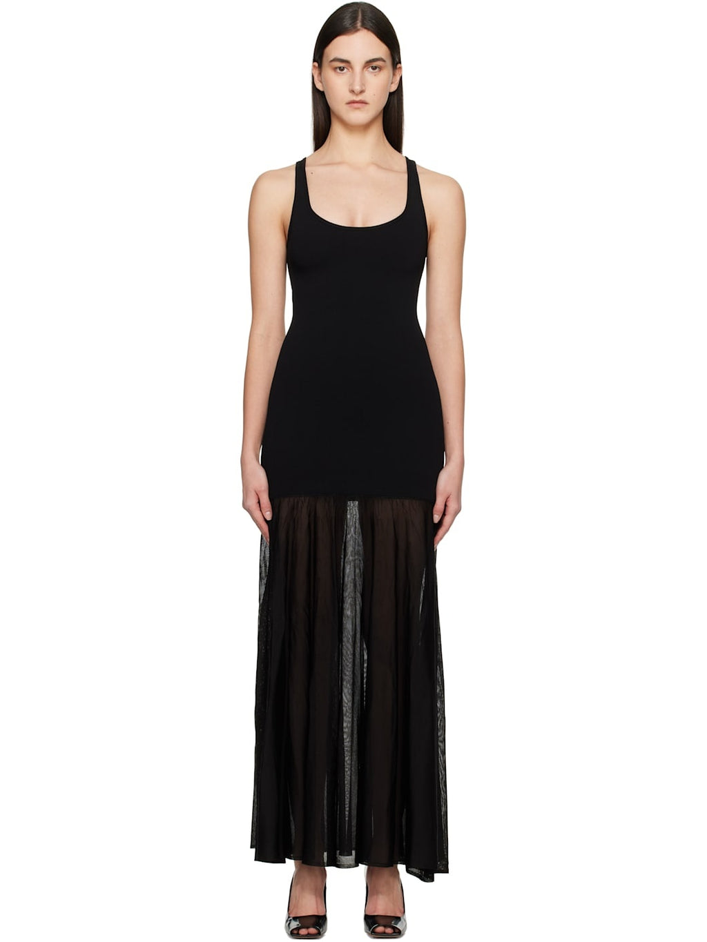 Elevate your evening style with this Black Evening Tank Maxi Dress by Toteme, crafted from a stretchy viscose-blend jersey combined with open-knit viscose for a flattering fit and breathable comfort. Its paneled construction and pleated skirt create graceful movement, while the rib-knit scoop neck and arms add subtle texture. Fixed shoulder straps ensure a secure fit, making this dress an elegant choice for any occasion where sophistication meets ease.