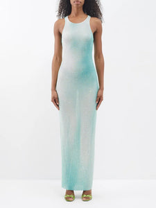 Experience pure opulence in the Crystal-embellished gradient-mesh maxi dress by Self Portrait. This shimmering green dress is crafted from gradient mesh adorned with hundreds of delicate crystals, creating a mesmerizing effect that is sure to turn heads. Elevate your style and make a statement with this luxurious and exclusive piece.