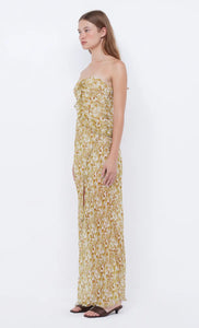 Elevate your style with the Opal Strapless Maxi Dress from bec + bridge. The lightweight, lustrous print fabric effortlessly drapes over your body, while the front leg split and asymmetrical raw cut ruffle detailing add a touch of sophistication. With a chic hanky drape hemline and versatile strapless neckline, this dress is perfect for any occasion. Add it to your wardrobe for an exclusive and timeless look.
