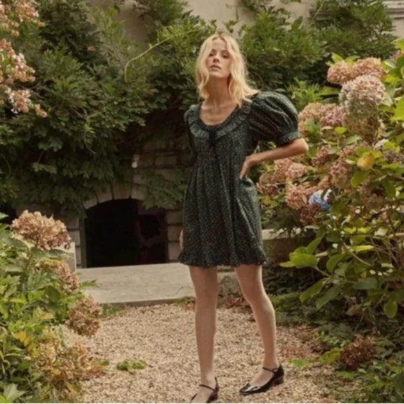 Discover effortless elegance with the Doen Marcela Forest Parc Monceau Mini Dress. Made with high-quality materials, this dress exudes luxury and comfort. With its tailored fit and classic design, it is perfect for any occasion. Experience timeless style and sophistication with the Marcela Mini Dress.