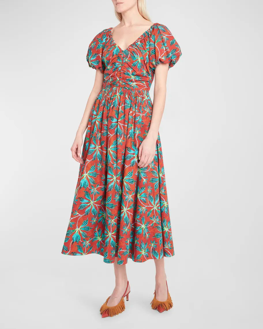 Get ready to turn heads in the Ulla Johnson "Cecile" dress. Made from soft, breathable cotton and featuring a beautiful moonflower print, this midi dress is perfect for any occasion. The flattering puff-sleeves and V neckline add a touch of femininity to this effortlessly chic and versatile piece.