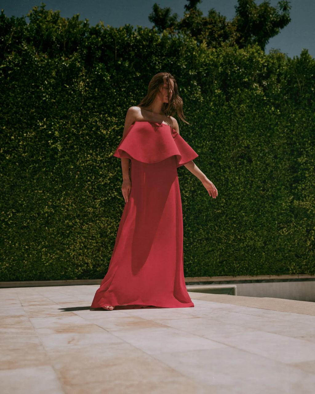Elevate your style with the Vela Long Sheer Strapless Dress by Jacquemus. This elegant piece combines sheer and opaque knit for a sophisticated look, featuring a strapless neckline and sleeveless design that highlights your shoulders. The straight silhouette gracefully skims the body, while the adjustable back strap ensures a perfect fit. Finished with a floor-pooling hem and discreet back zip, this dress promises effortless glamour for any occasion.