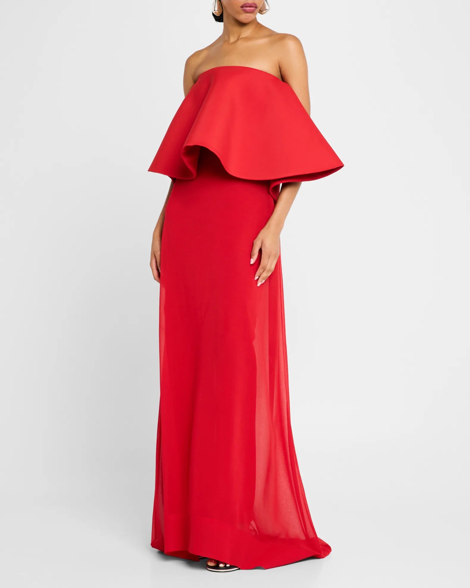Elevate your style with the Vela Long Sheer Strapless Dress by Jacquemus. This elegant piece combines sheer and opaque knit for a sophisticated look, featuring a strapless neckline and sleeveless design that highlights your shoulders. The straight silhouette gracefully skims the body, while the adjustable back strap ensures a perfect fit. Finished with a floor-pooling hem and discreet back zip, this dress promises effortless glamour for any occasion.