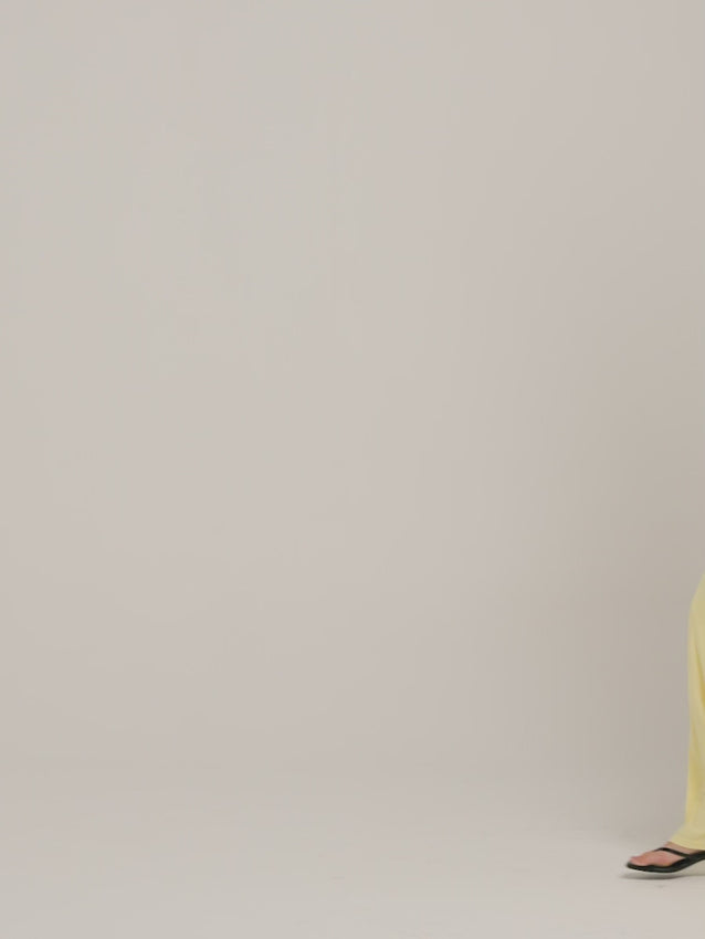 The Rosa Gown in Lemon combines timeless elegance with modern allure. Featuring a striking plunged neckline and graceful low back adorned with delicate silk trim, this gown exudes sophistication. The sumptuous jersey fabric drapes beautifully against your curves while the sweeping train adds dramatic flair. An ideal choice for galas, weddings, and formal celebrations where you want to leave a lasting impression.