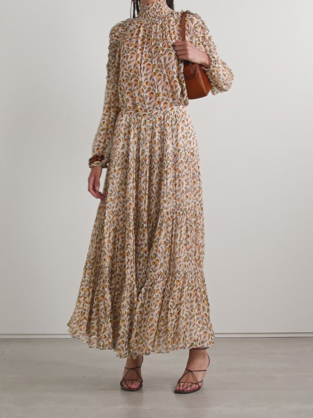 Ulla Johnson's Gaelle skirt is a showstopper with its enchanting feather print that deepens in intensity toward the hem. Crafted from luxuriously airy silk-crepon, the tiered silhouette creates a dreamy, flowing movement with every step. The graceful maxi length and whimsical design make it perfect for twirling through your day. Pair it with the matching blouse to complete this captivating ensemble.