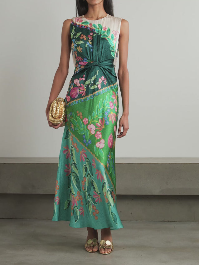 Elevate your wardrobe with the Gwen Twisted Draped Floral-print Silk Maxi Dress in Terrazzo by Saloni. Crafted from luxurious silk, it offers a flattering crew neckline and a uniquely twisted waist that enhances your silhouette. The straight skirt adds elegant movement, making it perfect for both daytime events and evening occasions. Experience comfort and style in one stunning dress designed to turn heads effortlessly.
