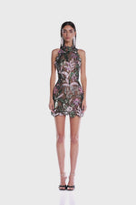 Load and play video in Gallery viewer, Unleash your daring side with the Leona Embroidered Mini Dress by Bronx and Banco. Make a statement in this elegant dress, featuring intricate sequin appliqué and a delicate scalloped hem and trim. With a halterneck and strapless design, a solid lining, and a back zipper closure, this dress is perfect for any bold and adventurous fashion lover!
