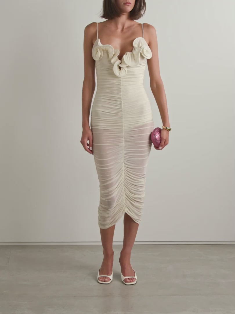 Magda Butrym's dress is underpinned with a built-in bodysuit that adds coverage to the otherwise sheer design. It's made from stretch-mesh that's intricately ruched throughout and has a ruffled neckline fitted with boning to keep its wavy shape. Complete your outfit with equally feminine accessories.