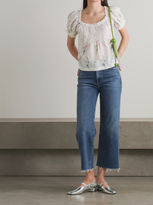 The Frederica blouse is pure prettiness in organic cotton-voile. Delicate pintucks run down the front while lace trims the prairie-style puffed sleeves, creating an effortlessly romantic silhouette. Light and billowy, this piece is perfect for vacation or everyday elegance—breathable enough for warm weather, refined enough for any occasion.