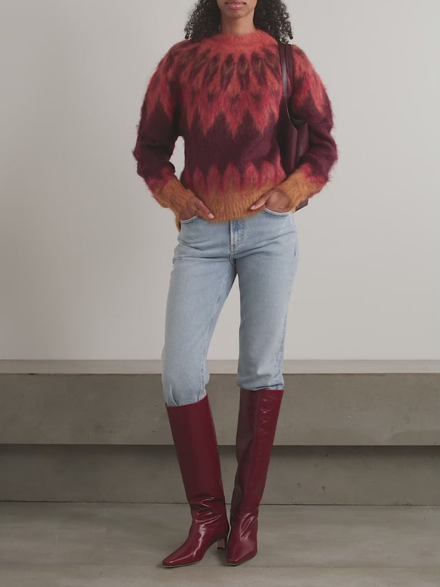 Wrap yourself in cozy sophistication with the Natania brushed Fair Isle intarsia-knit sweater. This charming piece features a timeless Fair Isle pattern woven directly into soft, brushed knit fabric that feels as good as it looks. The intarsia technique creates beautifully defined designs without bulky seams, making it perfect for layering or wearing solo. Whether you're heading to brunch or settling in for a relaxed weekend, this sweater brings effortless style and warmth to any outfit. 