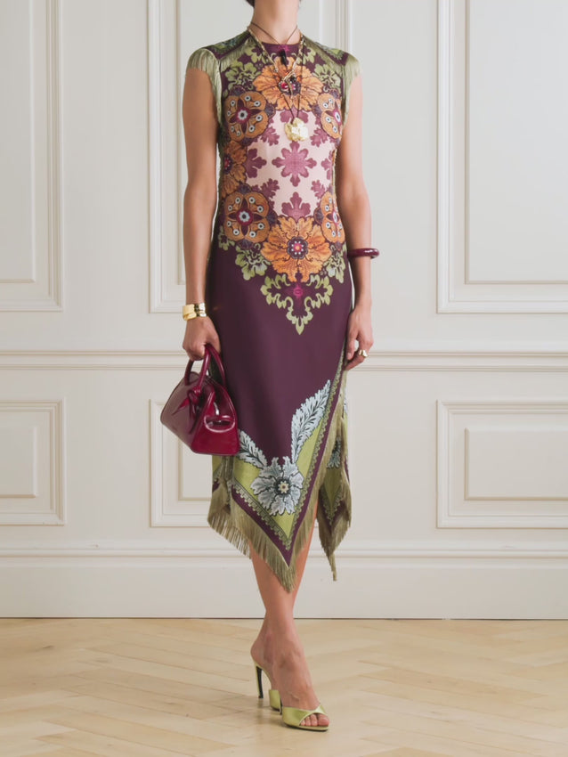 Embrace bold elegance with the Valkyrie asymmetric fringed printed silk dress. This striking piece features an asymmetrical silhouette that creates dynamic movement and visual interest, while luxurious silk delivers a fluid drape and sophisticated sheen. Intricate printed details add artistic flair, and playful fringe accents enhance the dress's contemporary edge. Perfect for making a statement at special occasions or elevating your everyday style with couture-inspired design. 