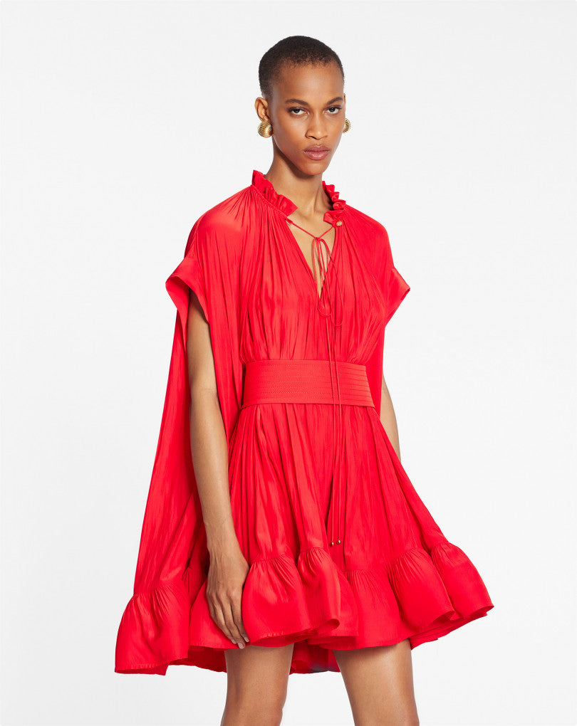 Effortlessly elegant, the LANVIN Short Charmeuse Dress is made from luxurious flowing fabric with short sleeves, a neck tie, and fitted waist for a flattering silhouette. The wide belt adds a touch of sophistication, while the horsehair adds volume and lightness to the dress. Perfect for any formal occasion.