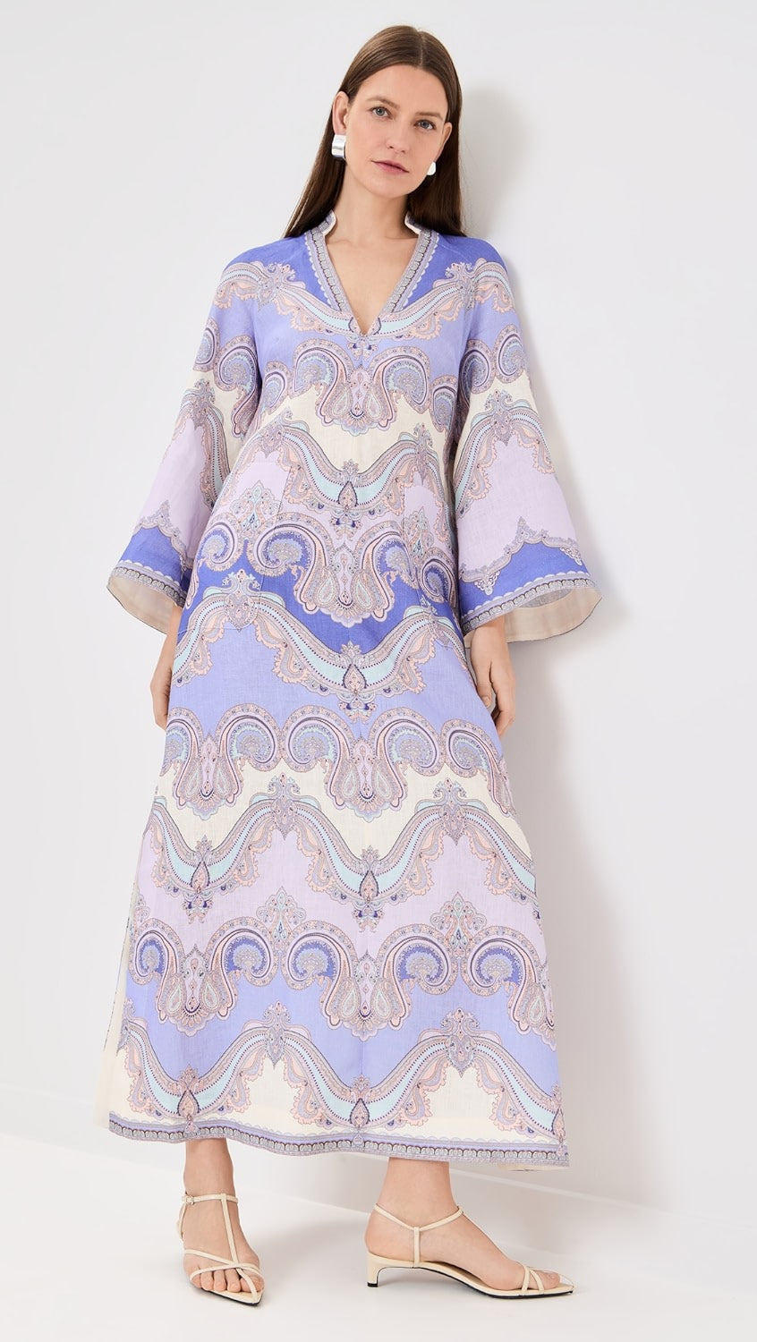 The Maxine Tunic Midi Dress by Zimmermann offers a flattering V-neck silhouette crafted from a mid-weight, non-stretch linen weave that ensures comfort and breathability. Featuring a discreet hidden zip at the back for a seamless look and practical patch front pockets, this dress combines effortless style with everyday functionality. Perfect for versatile wear, it delivers both elegance and convenience in one.