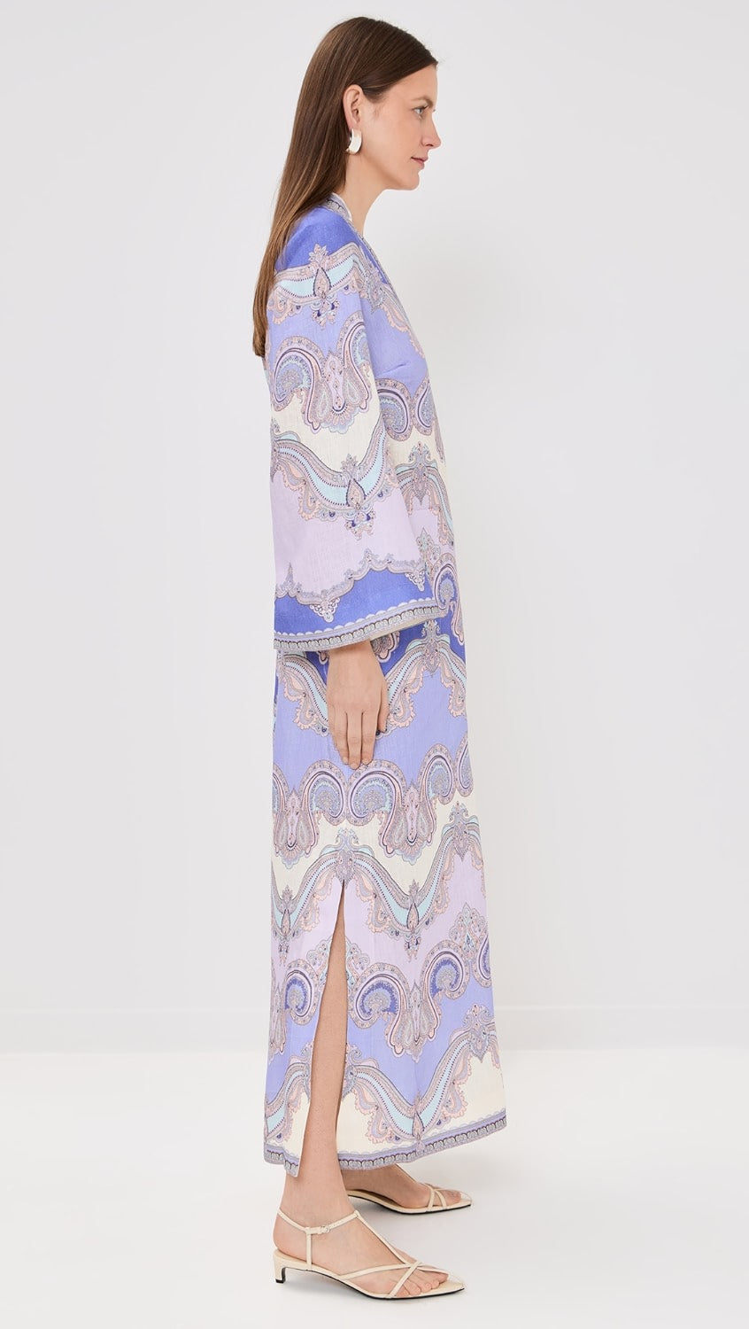 The Maxine Tunic Midi Dress by Zimmermann offers a flattering V-neck silhouette crafted from a mid-weight, non-stretch linen weave that ensures comfort and breathability. Featuring a discreet hidden zip at the back for a seamless look and practical patch front pockets, this dress combines effortless style with everyday functionality. Perfect for versatile wear, it delivers both elegance and convenience in one.