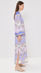 The Maxine Tunic Midi Dress by Zimmermann offers a flattering V-neck silhouette crafted from a mid-weight, non-stretch linen weave that ensures comfort and breathability. Featuring a discreet hidden zip at the back for a seamless look and practical patch front pockets, this dress combines effortless style with everyday functionality. Perfect for versatile wear, it delivers both elegance and convenience in one.