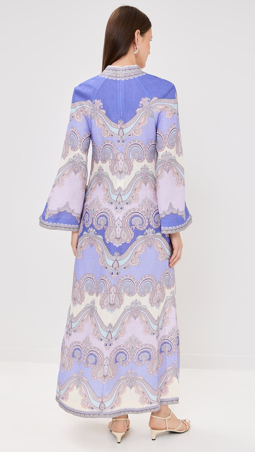 The Maxine Tunic Midi Dress by Zimmermann offers a flattering V-neck silhouette crafted from a mid-weight, non-stretch linen weave that ensures comfort and breathability. Featuring a discreet hidden zip at the back for a seamless look and practical patch front pockets, this dress combines effortless style with everyday functionality. Perfect for versatile wear, it delivers both elegance and convenience in one.