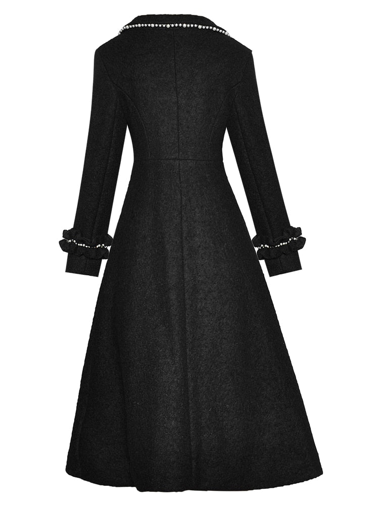 Discover the perfect blend of style and warmth with Veste Marcia, the Designer Autumn Winter Wool Coat for women. Crafted with long sleeves and a single-breasted design, this black overcoat features delicate beading and crystal accents for a touch of elegance. Stay fashionable and cozy this season.