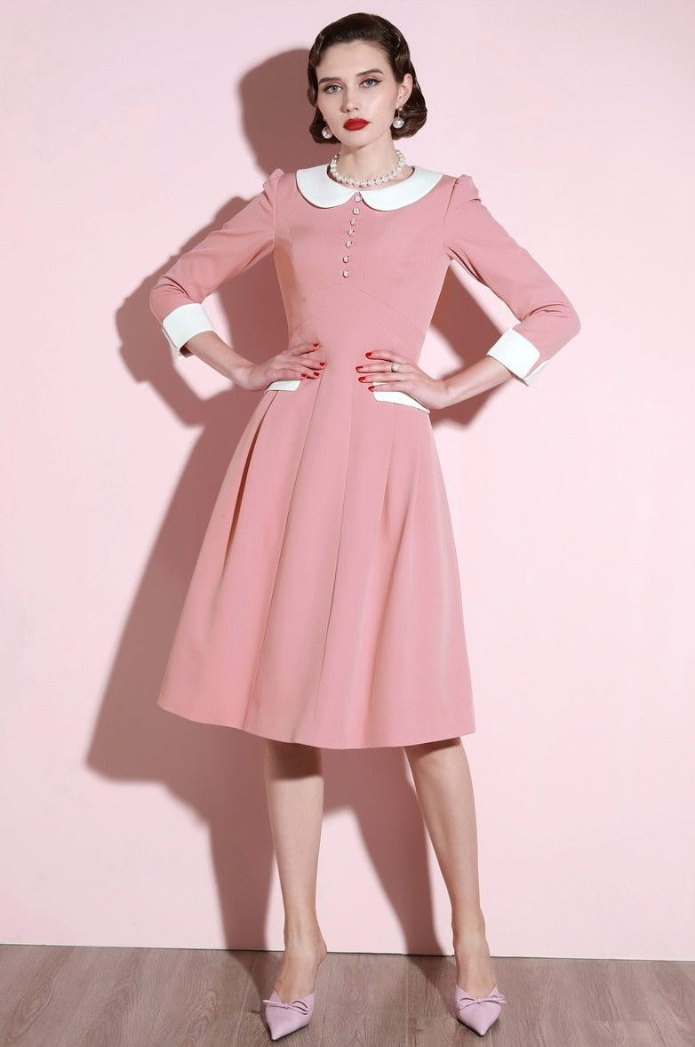 The Robe Selina is a stunning vintage French dress that exudes elegance. Its delicate pink color and tea length style will make you feel like royalty. Perfect for any occasion, this exquisite robe will make you stand out and turn heads wherever you go. Embrace the timeless beauty and sophistication of this dress.