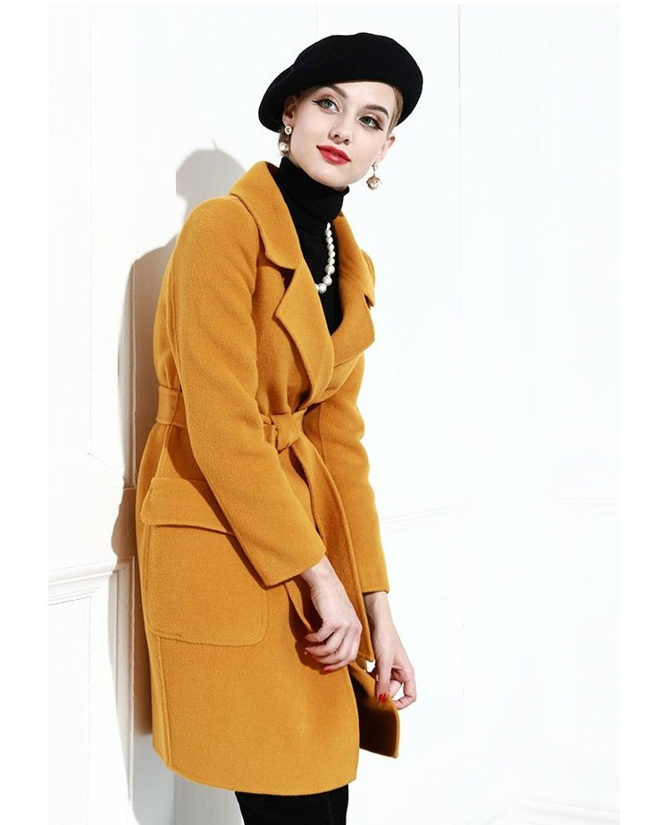 Wrap yourself in luxury with our Helen Cashmere Coats. Made from double-sided wool, these coats are perfect for keeping you warm and stylish. Available in a stunning yellow color and medium length. Don't sacrifice comfort for style, with our coats you can have both.