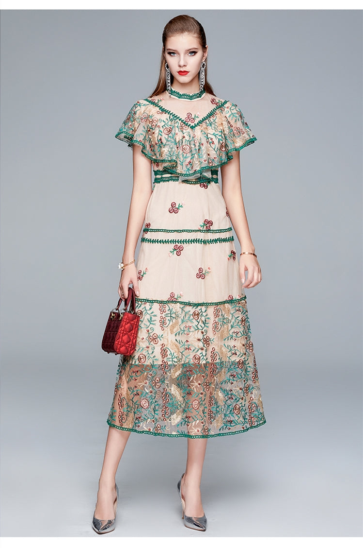 Indulge in elegance with our Robe Malin, a beautiful summer dress with embroidered lace mesh. Elevate your style and show off your sophisticated temperament in this exclusive piece. Crafted with delicate details, experience luxury fashion with each wear.