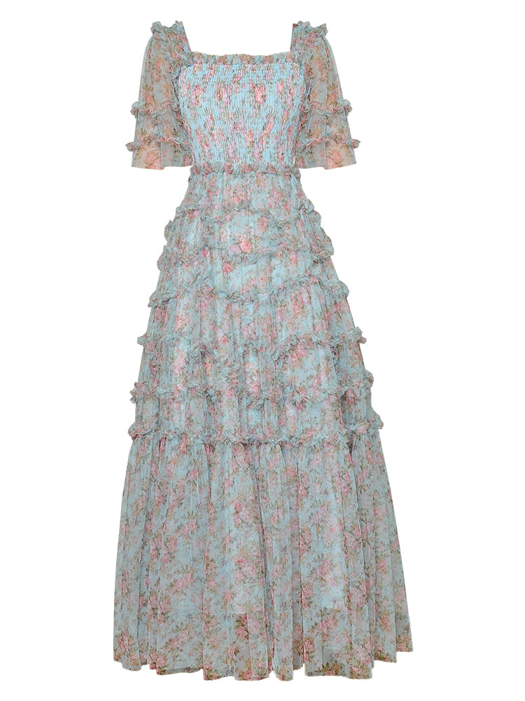 Experience true luxury with our Robe Diane. This elegant mesh tulle maxi dress exudes sophistication and exclusivity with its chic ruffles and doll-like silhouette. Perfect for elegant evenings and special occasions, this dress will make you feel like you're walking on a runway. Indulge in the best with Robe Diane.