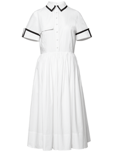 This French Retro Dress exudes a vintage charm, inspired by Audrey Hepburn's iconic style. Made from cotton, its umbrella skirt design and doll collar add a touch of elegance. The perfect dress for a summer day, bringing a classic and timeless look to any wardrobe.