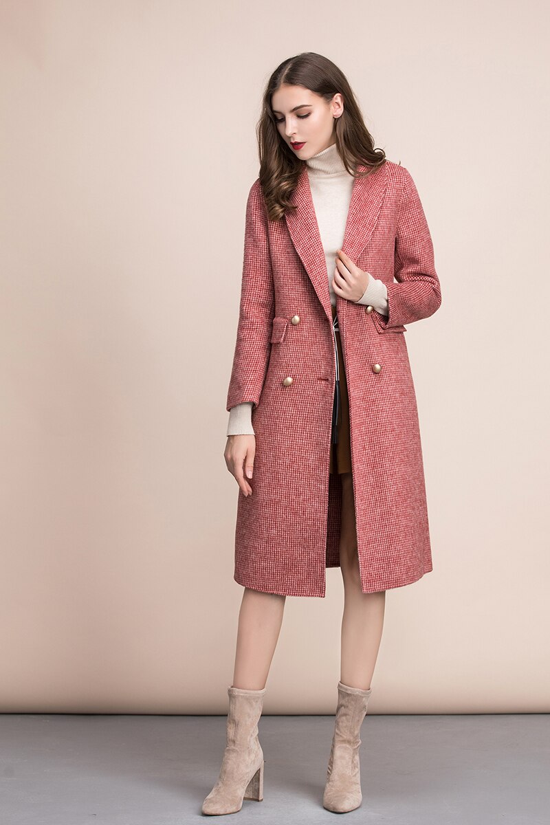 Stay warm and stylish with our Veste Cataleya - a 100% pure wool double breasted elegant overcoat for women. Crafted with high-quality material, this long coat provides superior warmth and comfort. Perfect for any occasion, it's a must-have addition to any wardrobe.