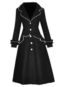 Discover the perfect blend of style and warmth with Veste Marcia, the Designer Autumn Winter Wool Coat for women. Crafted with long sleeves and a single-breasted design, this black overcoat features delicate beading and crystal accents for a touch of elegance. Stay fashionable and cozy this season.