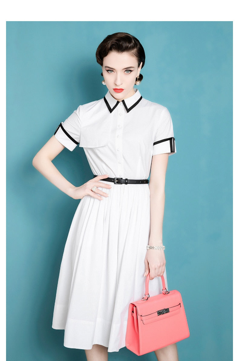 This French Retro Dress exudes a vintage charm, inspired by Audrey Hepburn's iconic style. Made from cotton, its umbrella skirt design and doll collar add a touch of elegance. The perfect dress for a summer day, bringing a classic and timeless look to any wardrobe.