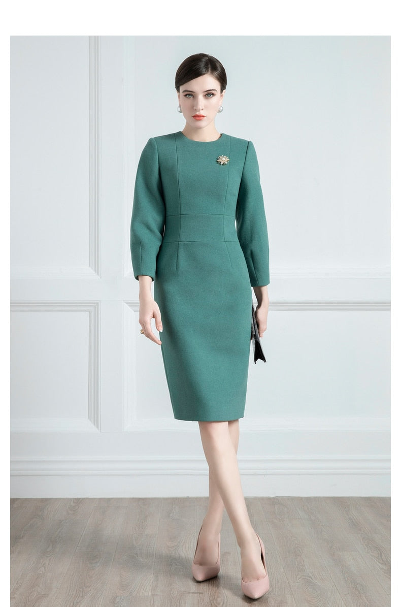 Experience luxury and style with the Robe Chanel. Made with high end wool fabric, this dress exudes elegance and sophistication. The vintage lantern sleeves and round neck add a touch of classic charm, while the medium long length is perfect for the autumn/winter season. Elevate your wardrobe with this new, refined look.