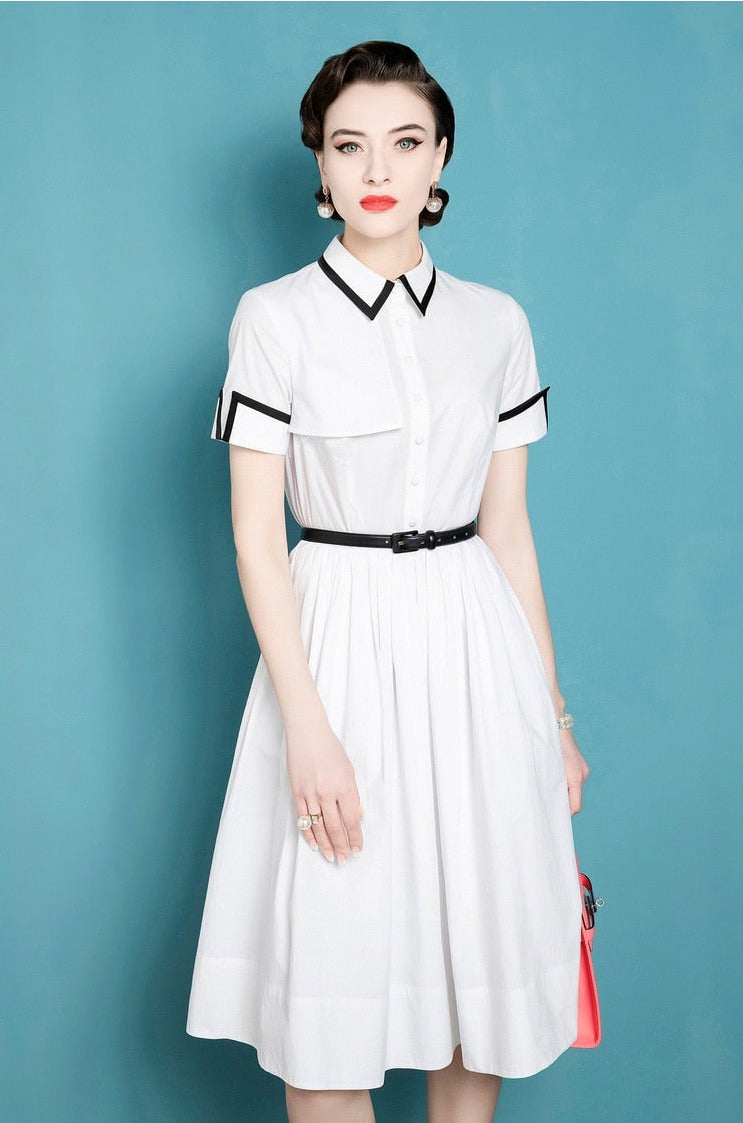 This French Retro Dress exudes a vintage charm, inspired by Audrey Hepburn's iconic style. Made from cotton, its umbrella skirt design and doll collar add a touch of elegance. The perfect dress for a summer day, bringing a classic and timeless look to any wardrobe.