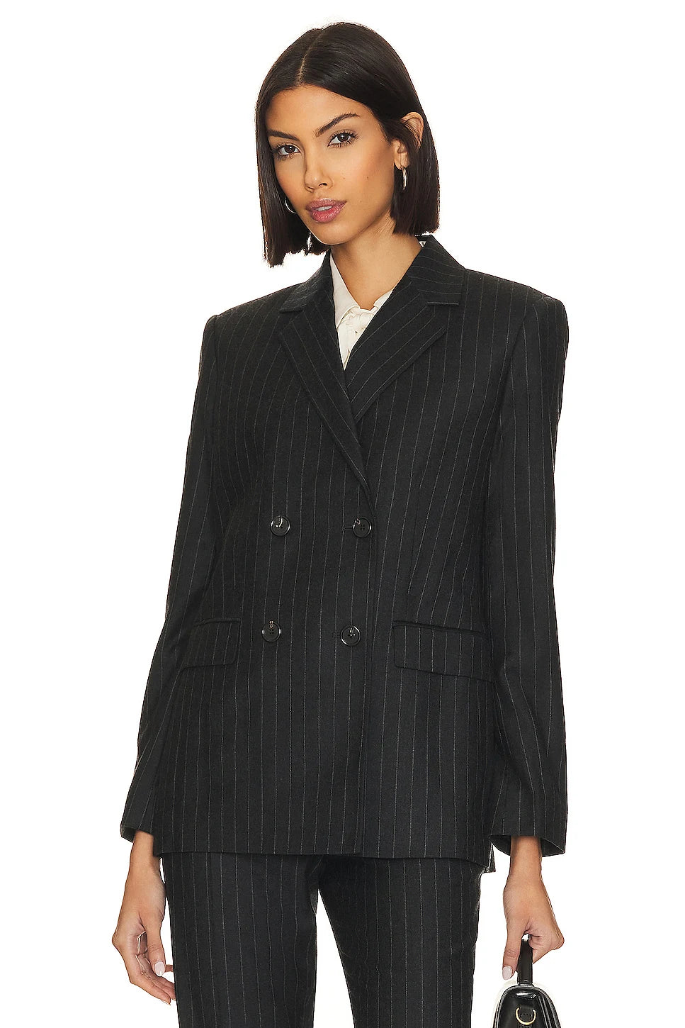 Step up your professional style with the Ensemble Mathilda—a business suit jacket and pants combo designed to take on the commute with style and attitude. Feel confident, empowered, and ready to tackle the day with this bold two-piece made to inspire.