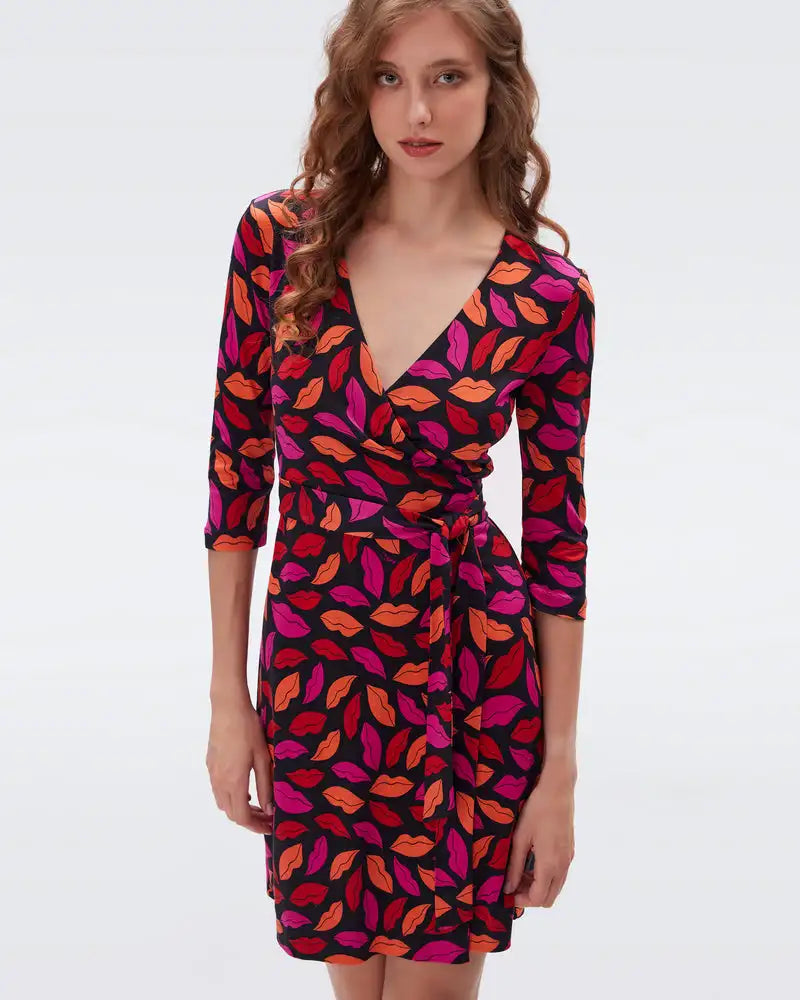 Elevate your style with our Robe Ausha! This personalized, mid-length dress features a unique French fashion print and a flattering split, making it the perfect statement piece for any occasion. Unleash your inner fashionista and turn heads with this original and chic dress.