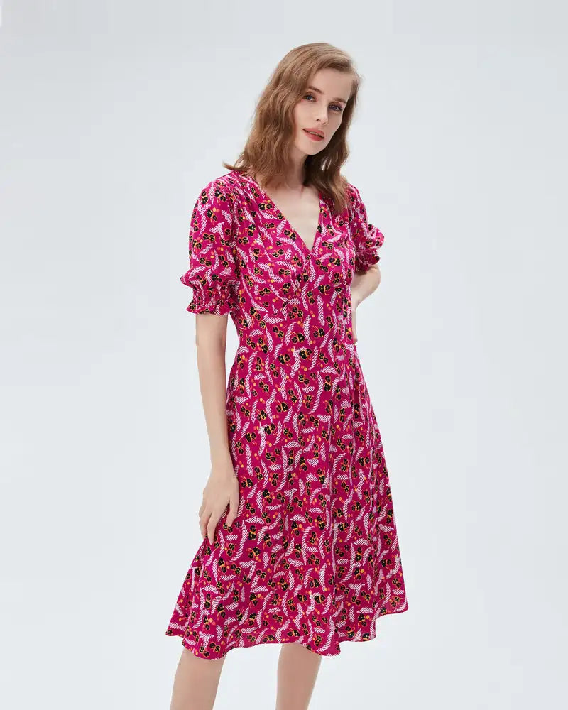 Elevate your wardrobe with our Robe Vienna. This French style dress boasts a personalized touch with its original V-neck design and elegant mid-length cut. Indulge in luxury fashion with the intricate fashion print that will make you feel like a work of art.
