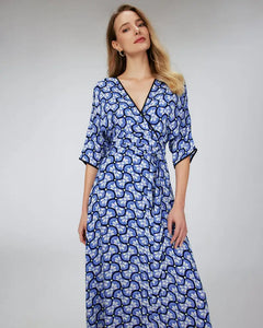 Indulge in a luxurious fashion experience with our Danica Robe. This French-inspired, mid-length dress boasts a personalized, original print that exudes style and sophistication. The split design adds a unique touch, making it a must-have for any fashionista. Elevate your wardrobe with this elegant and exclusive piece.