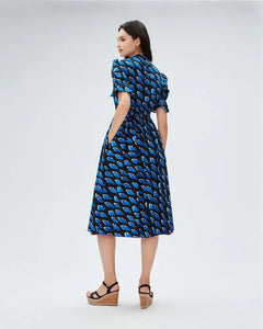 This French-inspired fashion dress exudes elegance with its unique personalized print and chic split mid length design. Be the envy of others with this luxurious and exclusive dress, perfect for any upscale event or gathering. Elevate your style and make a statement with this stunning piece.
