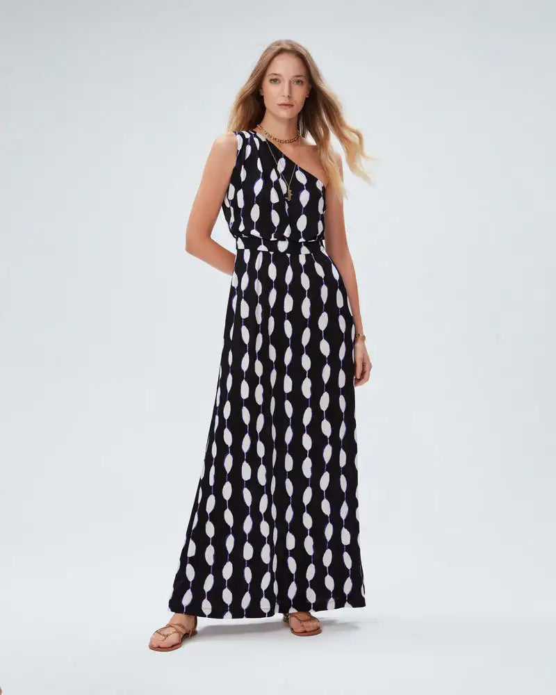 Elevate your style with our French Style Fashion Dress by DVF. This one-shoulder, mid-length dress features a unique abstract print, adding a personalized touch to your wardrobe. Stand out from the crowd and make a statement with this original and stylish dress.