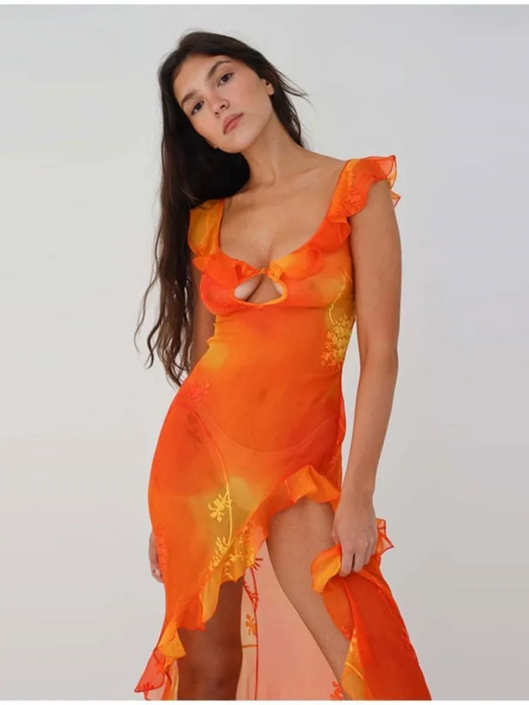 This stunning Dress Sunset features a vibrant orange tie-dyed print, perfect for those sunny summer days. The low cut back and backless design add a touch of allure, while the ruffle and high split details give it a chic and feminine look. Elevate your style and turn heads at any party or evening event with this eye-catching dress.