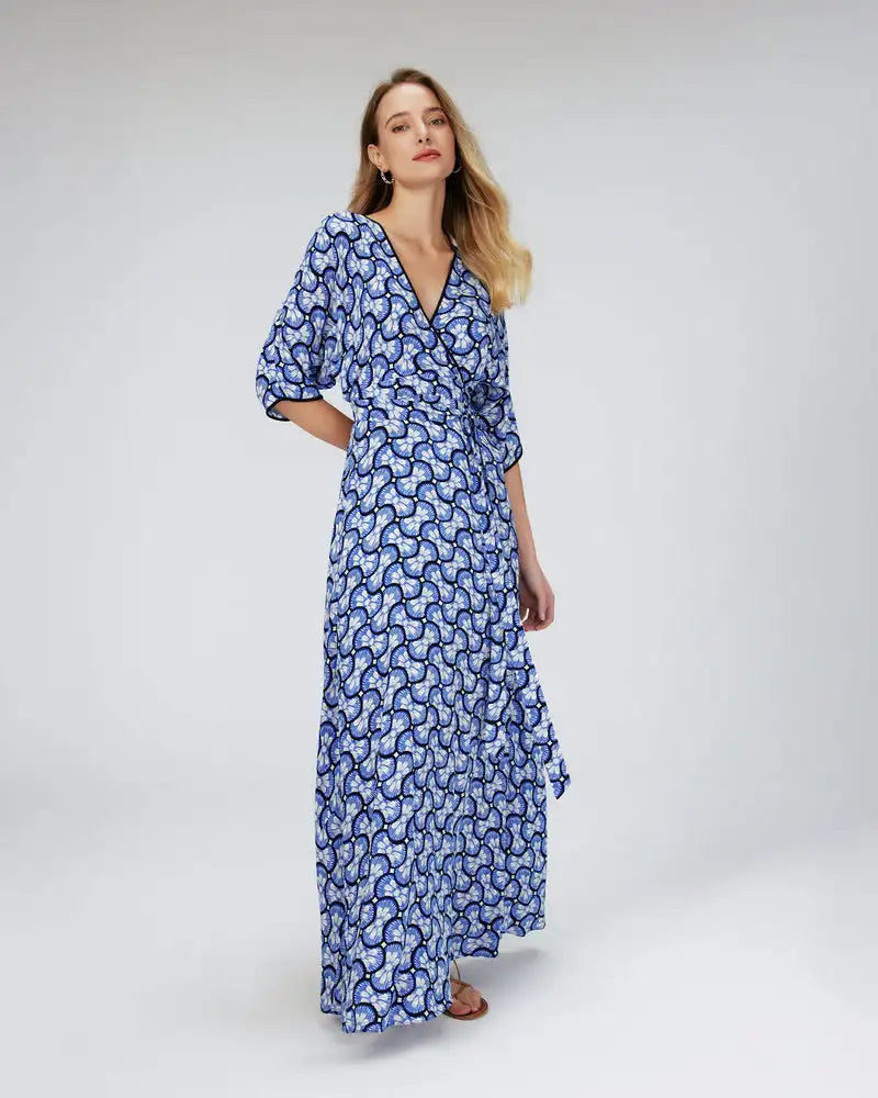 Indulge in a luxurious fashion experience with our Danica Robe. This French-inspired, mid-length dress boasts a personalized, original print that exudes style and sophistication. The split design adds a unique touch, making it a must-have for any fashionista. Elevate your wardrobe with this elegant and exclusive piece.