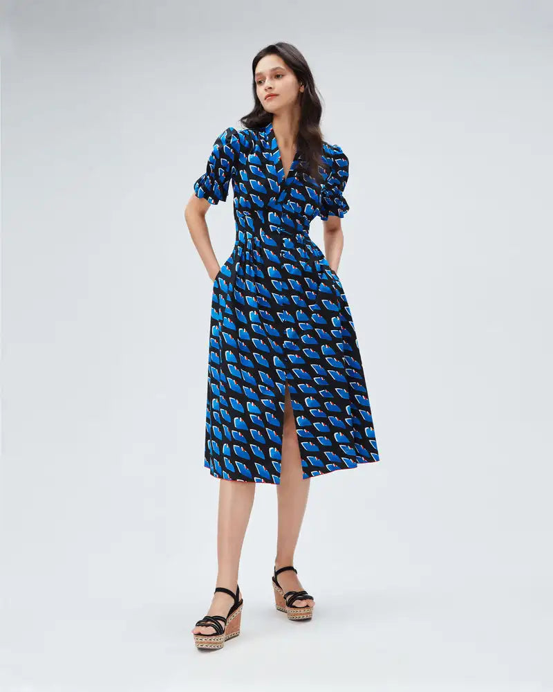 This French-inspired fashion dress exudes elegance with its unique personalized print and chic split mid length design. Be the envy of others with this luxurious and exclusive dress, perfect for any upscale event or gathering. Elevate your style and make a statement with this stunning piece.