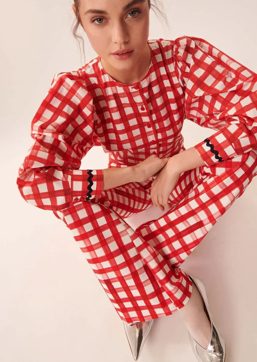 Stay stylish and unique with the Ensemble Eloise two-piece set. This set features a personalized original plaid shirt and fashionable wide leg pants, perfect for showcasing your unique taste. With its comfortable fit and trendy design, this set exudes confident and fashion-forward vibes. Elevate your wardrobe with this must-have ensemble.