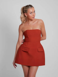Look effortlessly chic in this beautiful Robe Charlize dress. Crafted with a sleek slim fit, this strapless dress cinches your waist for a luxurious figure-hugging silhouette. Featuring backless pockets and A-line cut, this dress is the perfect blend of modern and classic style for a timeless look. Look and feel stylish with this dazzling mini dress.